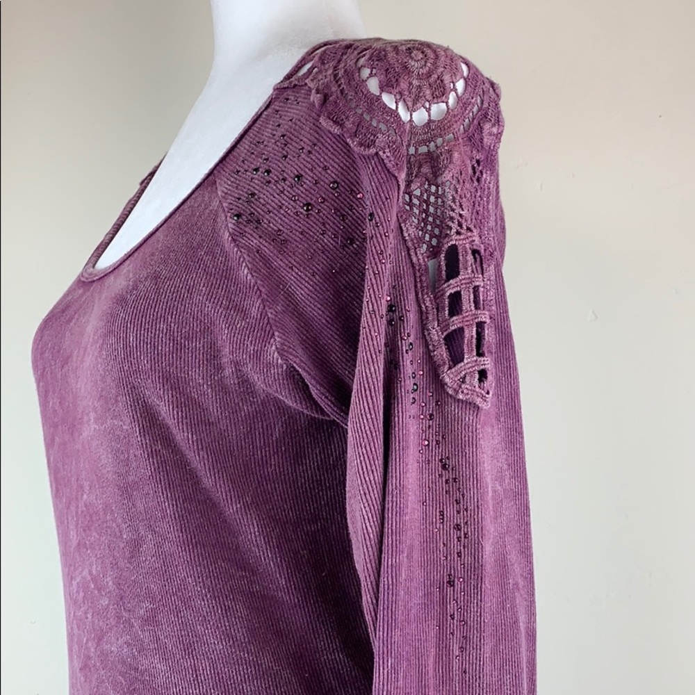 Beautiful One World grape colored top.